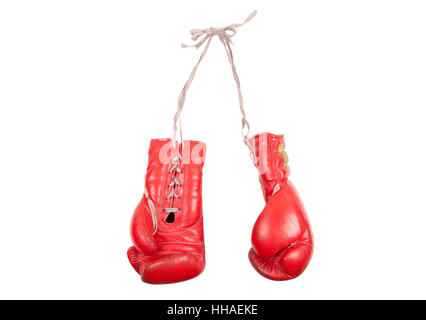 used and battered red leather boxing gloves, isolated on white background Stock Photo