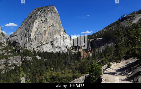 In view are Liberty Cap and Nevada Falls. Photographed from the John Muir Trail, Yosemite National Park, California. Stock Photo