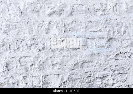 Old clay bricks.Vintage brick wall with white plaster texture or background Stock Photo