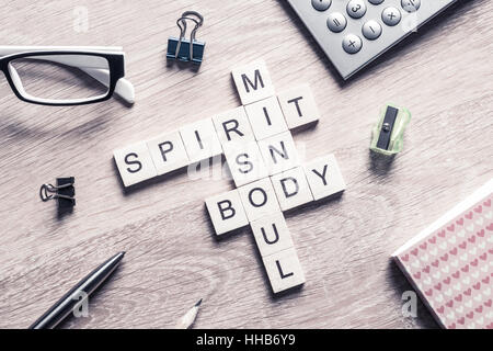 Spirit soul mind and body words made of wooden cubes Stock Photo