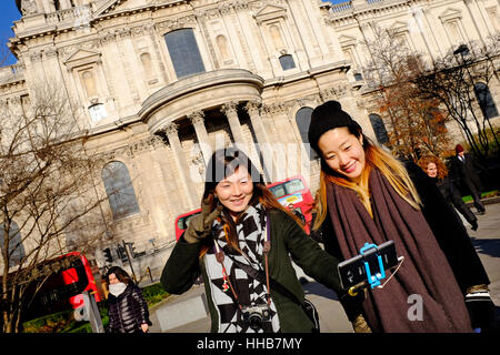 female chinese tourists taking selfie photograph Stock Photo