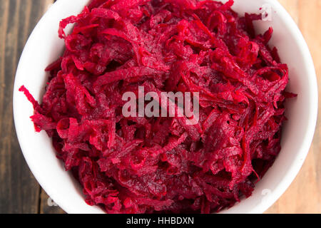 Fresh Grated Beet Salad in a Bowl. Stock Photo