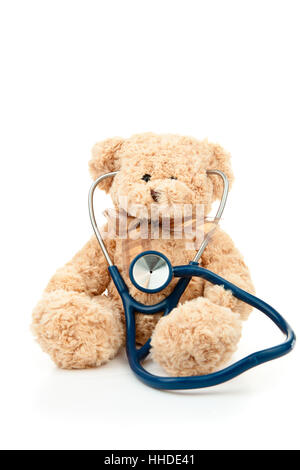 Teddy bear with a stethoscope against a white background Stock Photo