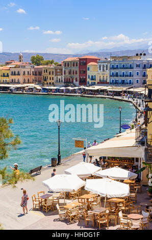 The Venetian harbour of Chania surrounded by cafés and restaurants along the waterfront, Crete, Greece Stock Photo