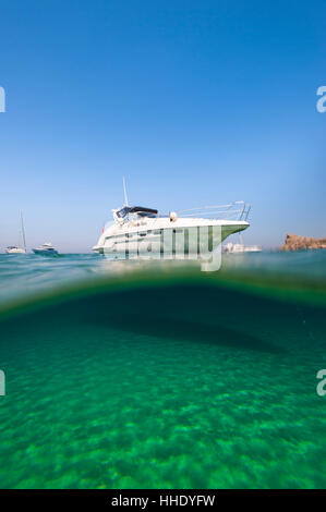 A speedboat moored at San Blas Bay off the island of Gozo near Malta, Mediterranean Stock Photo