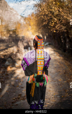 Kalasha woman from Kalasha valley wearing traditional dress, North West Frontier Province, Pakistan Stock Photo