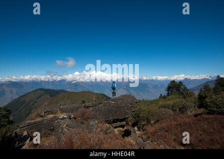 Taking in the view of the Himalayan Range on the trail between Sian Gompa and Gosainkund in the Langtang region, Nepal Stock Photo