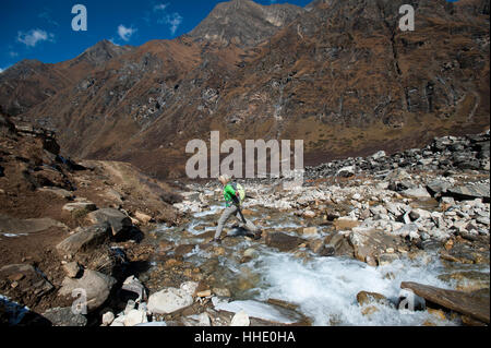 Stepping stones and stream on the trail in the Kagmara Valley, a less trodden path, Dolpa, Nepal Stock Photo