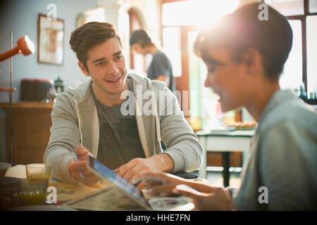 Young couple college students using digital tablet Stock Photo