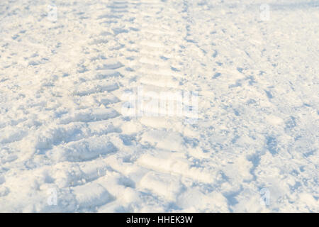 Car Tracks In Fresh White Snow Stock Photo - Alamy