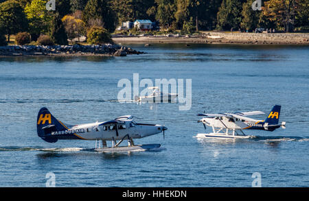 Harbour Air seaplanes preparing for takeoff at the Vancouver Harbour Flight Centre, British Columbia, Canada. Stock Photo