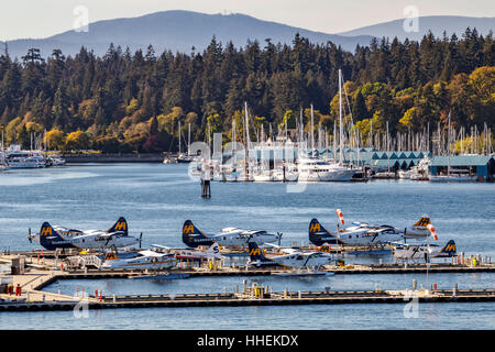 Harbour Air seaplanes moored at the Vancouver Harbour Flight Centre, British Columbia, Canada. Stock Photo