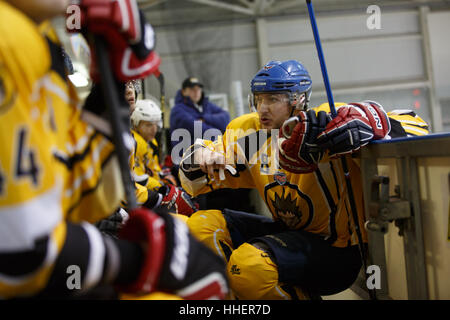 Moscow, Russia - January, 07, 2017: Amateur hockey league LHL-77. Game between hockey team 'New Jersey 53' and hockey team 'Reds'. Stock Photo