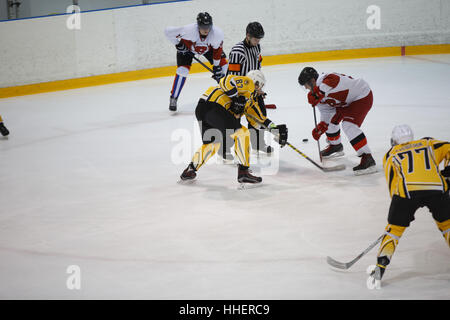 Moscow, Russia - January, 07, 2017: Amateur hockey league LHL-77. Game between hockey team 'New Jersey 53' and hockey team 'Reds'. Stock Photo