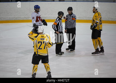 Moscow, Russia - January, 07, 2017: Amateur hockey league LHL-77. Game between hockey team 'New Jersey 53' and hockey team 'Reds'. Stock Photo