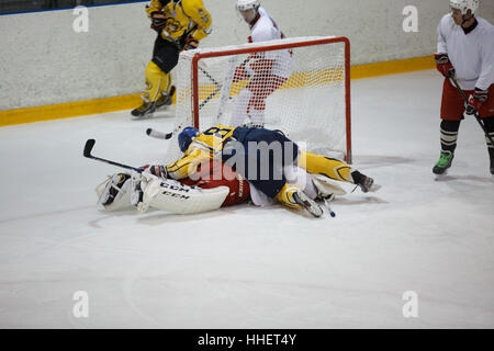 Moscow, Russia - January, 07, 2017: Amateur hockey league LHL-77. Game between hockey team 'New Jersey 53' and hockey team 'Reds'. Stock Photo