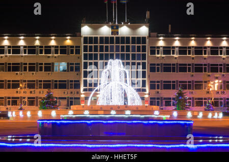 Anapa, Russia - January 7, 2017: Night landscape with a view of the administration of the city of Anapa resort and the fountain in front of it in the Stock Photo