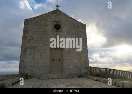 The Saint Mary Magdalene Chapel on the Dingli Cliffs overlooks the Mediterranean Sea in southern Malta, built in 1646. Stock Photo