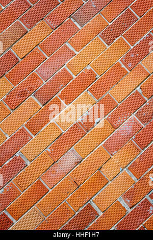 Background of old red and dotted brick wall texture, abstract architecture wallpaper Stock Photo