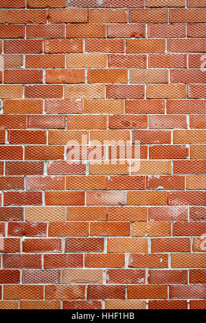 Background of old red and dotted brick wall texture, abstract architecture wallpaper Stock Photo