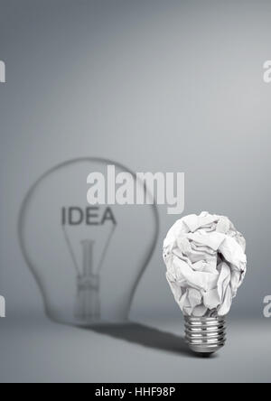 Ideas creativity concept, Bulb with crumpled paper Stock Photo