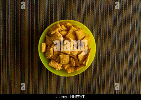 A bowl of shredded wheat breakfast cereal Stock Photo