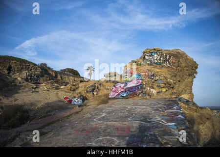 San Pedro, USA. 16th Jan, 2017. The area of abandoned roads and suburban development is a popular place to watch the sunset on the Palos Verdes Peninsula. The area is technically off limits to the public but graffiti artists and beachgoers alike crowd the area on weekends. Credit: Stuart Palley/ZUMA Wire/Alamy Live News Stock Photo