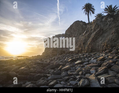 San Pedro, USA. 16th Jan, 2017. The area of abandoned roads and suburban development is a popular place to watch the sunset on the Palos Verdes Peninsula. The area is technically off limits to the public but graffiti artists and beachgoers alike crowd the area on weekends. Credit: Stuart Palley/ZUMA Wire/Alamy Live News Stock Photo