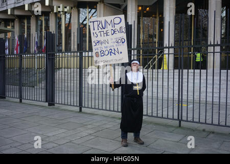 London, UK. 19th Jan, 2017. A man dress as a nun protest ahead of Donald Trump inauguration at US Embassy London, UK. by Credit: See Li/Alamy Live News Stock Photo