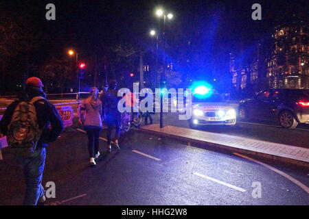 London, UK. 19th Jan, 2017. A suspected WWII unexploded bomb found during marine engineering works has closed the Embankment on the River Thames between Westminster and Embankment tube stations, outside the National Liberal Club in Whitehall Place. Police sources said it was ' a public safety issue' whilst a nearby workman said that it was believed that an unexploded bomb from WWII had been found in the river. Traffic was diverted and cyclists were denied use of their super highway in the name of safety. Credit: Peter Hogan/Alamy Live News Stock Photo