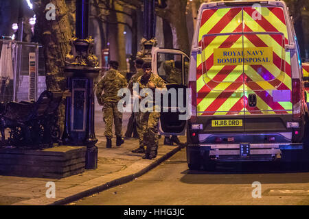 London, UK. 19th Jan, 2017. Bomb disposal experts from the Royal Navy arrive at Victoria Embankment to defuse and remove an unexploded bomb discovered between Hungerford Bridge and Westminster Bridge, near the Houses of Parliament, by engineers working in the River Thames. Credit: Paul Davey/Alamy Live News Stock Photo