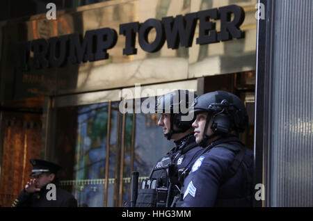 New York City, USA. 19th Jan, 2017. Police officers stand guard at the entrance of Trump Tower in New York. U.S. President-elect Donald Trump's inauguration will be held in Washington, D.C. Credit: Wang Ying/Xinhua/Alamy Live News Stock Photo