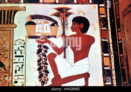 Wall painting depicting a servant with offerings. From the tomb of the ancient Egyptian artisan Menna (Scribe of the Fields of the Lord of the Two Lands), probably during the reign of Thutmose IV during the 18th dynasty. He was buried in a well decorated tomb, TT69, located in the Sheikh Abd el-Qurna district of the Maadi, opposite Luxor in Egypt Stock Photo