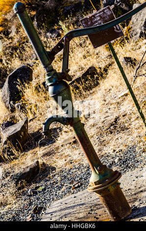 An antique hand operated well pump Stock Photo