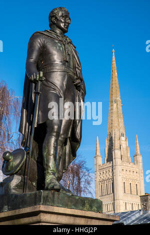A statue of the Duke of Wellington with the beautiful Norwich Cathedral in the background, in the historic city of Norwich, UK. Stock Photo