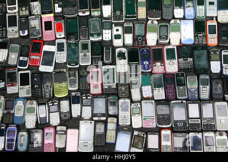 Bangkok, Thailand - May 05, 2012: Second hand Vintage Feature Mobile Phone sale for spare part in Klong Thom market in Bangkok Thailand. Stock Photo