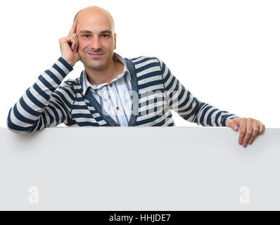 Young casual guy with blank poster looking at camera Stock Photo