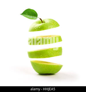 sliced green apple levitating on white background Stock Photo