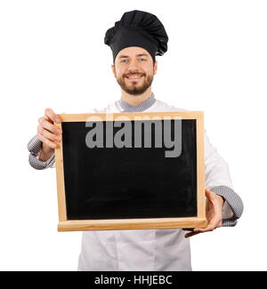 smiling chef holding blank blackboard in front Stock Photo