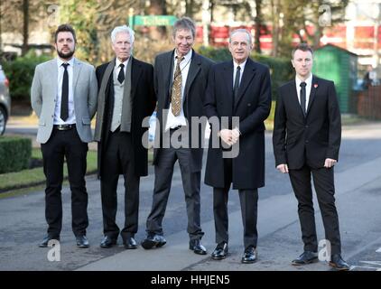Status Quo band members (left-right) Leon Cave, Andy Bown, John 'Rhino' Edwards, Francis Rossi and Richie Malone arrive at Woking Crematorium for the funeral of Status Quo guitarist Rick Parfitt who died on Christmas Eve. Stock Photo