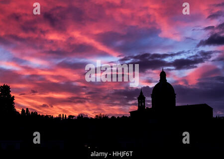 Sunset in Florence, Italy over the Arno river and the church of San Frediano in Cestello. Stock Photo