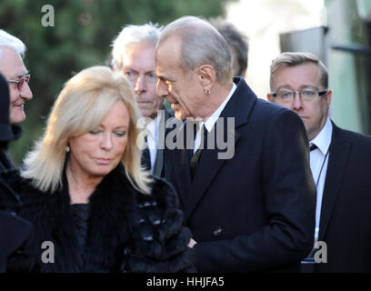 Francis Rossi (right) arrives at Woking Crematorium for the funeral of Status Quo guitarist Rick Parfitt who died on Christmas Eve. Stock Photo