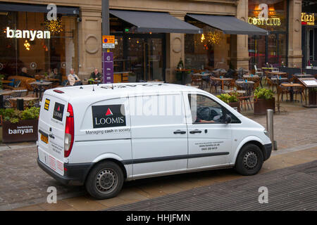 Loomis Cash Security Van. Managing cash in society,  in Exchange Square, Manchester City centre, UK Stock Photo