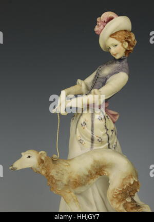 Capodimonte Bruno Merli Porcelain Figurine Lady with Borzoi Stock Photo