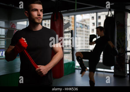 Portrait of young man boxing Stock Photo