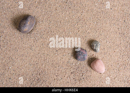 zen garden sand waves and rock sculptures Stock Photo