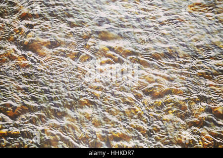 Blurred abstract natural background, shallow creek. Stock Photo