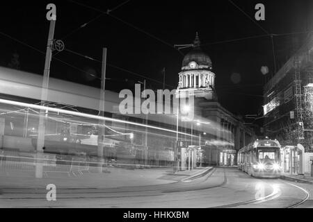 Trams in Nottingham Market Square at night Stock Photo