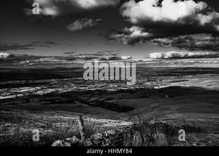 A view from Pendle Hill. In distance Yorkshire's highest peaks: Pen-y-Ghent, Ingleborough, Whernside. Forest Of Bowland. Lancashire. England, UK Stock Photo
