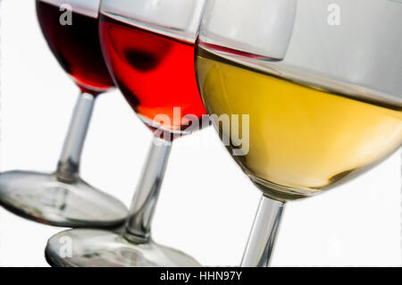 3 glasses of red, rose and white wine Stock Photo